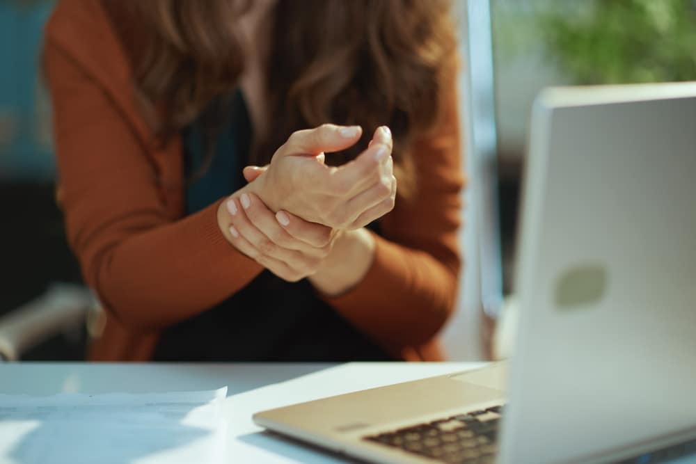Closeup,On,Small,Business,Owner,Woman,With,Laptop,Experience,Carpal 1763656758 515916bb95c44cd08edb51a028433fe8 1 Carpal Tunnel Specialist in East Brunswick, NJ